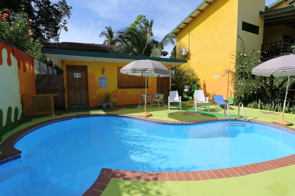 Hotel Boutique La Casa De Las Flores Cahuita Exterior photo